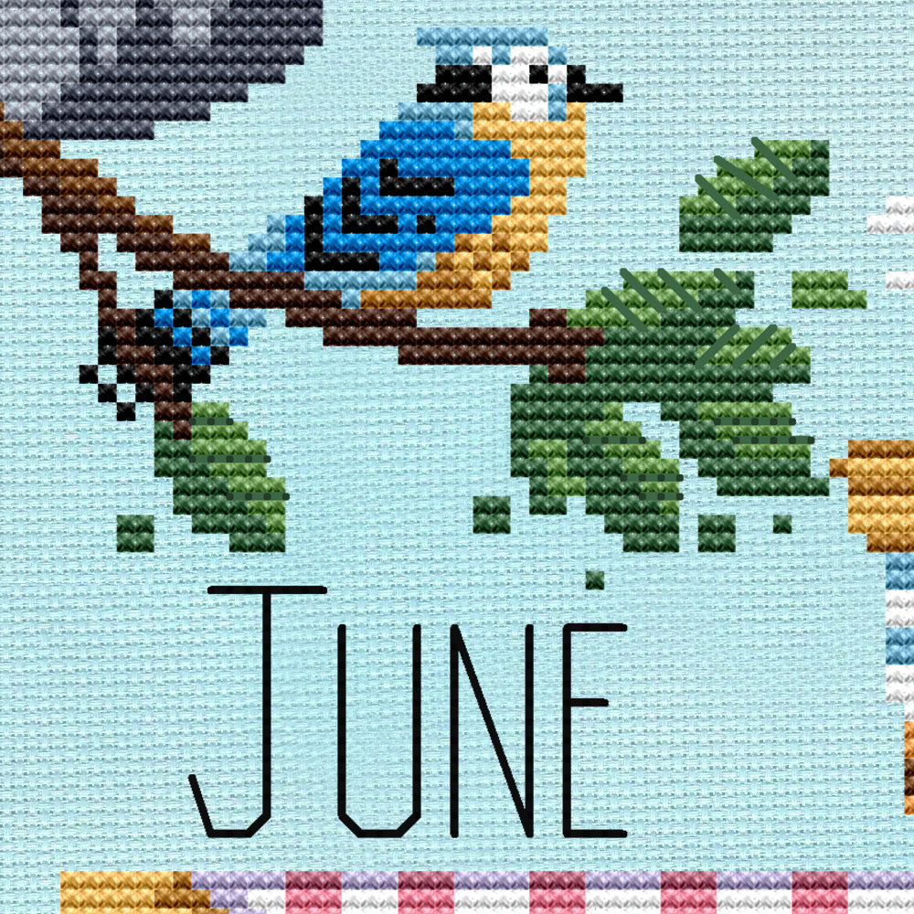 Cross stitch pattern of a blue jay sitting on a branch
