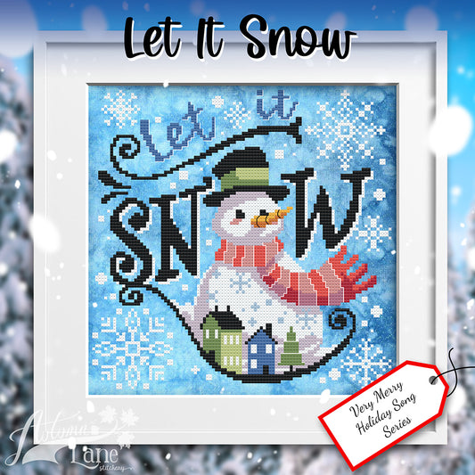 Frosty the snowman with scene of a village in his stomach. Text reads let it snow. Frosty's head takes the place of the o. fancy snowflakes spread throughout the image.